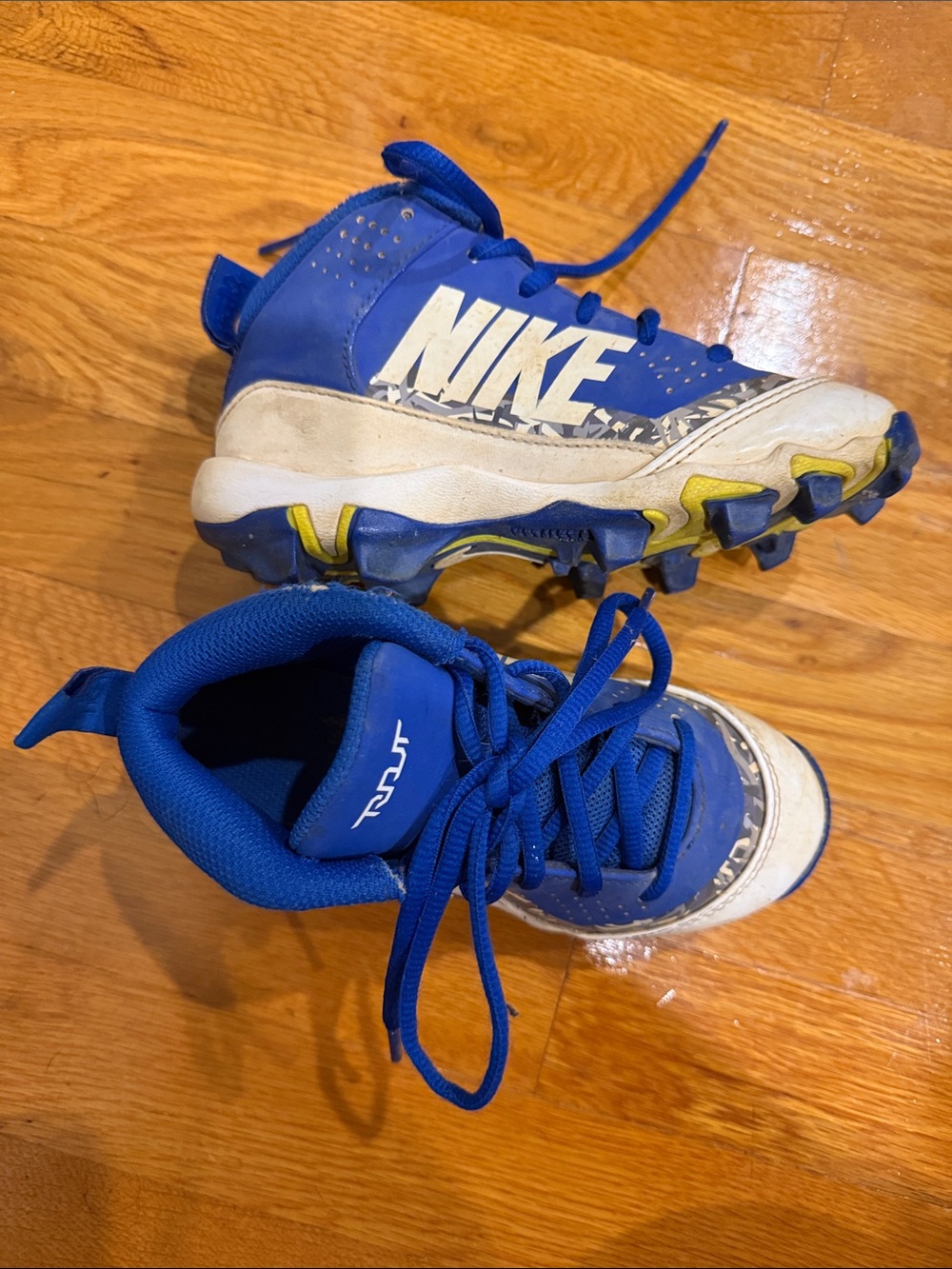 Nike Kids Blue and White Cleats 12 Kids